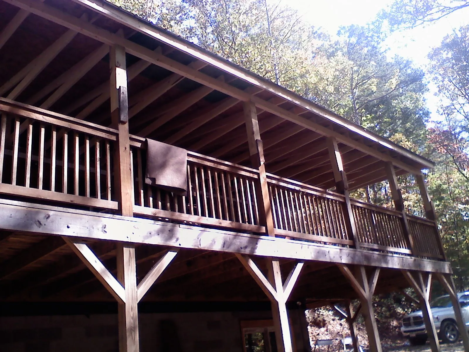 Timber framing under a new elevated porch and deck — Roof Leak Repair in Pico Rivera by Roofing Brothers